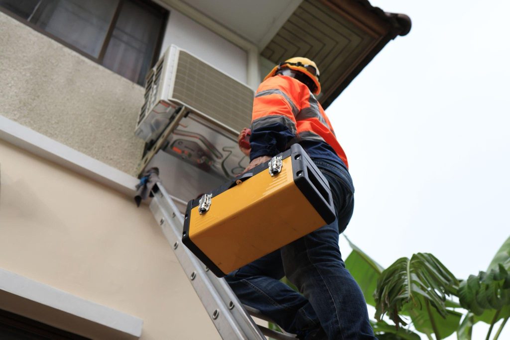 electrical contractors at climbing work